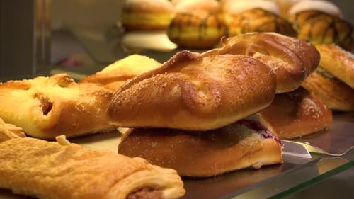 Closeup on Baked Goods on Display on a Counter in a Bakery