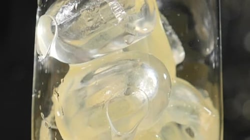 Pouring Juice on Ice Cubes