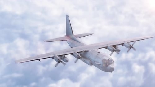 Heavy Military Transport Aircraft Flying Over Clouds