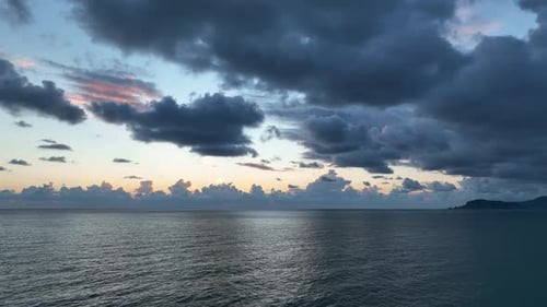 Cloudy sunset at sea aerial view 4 K