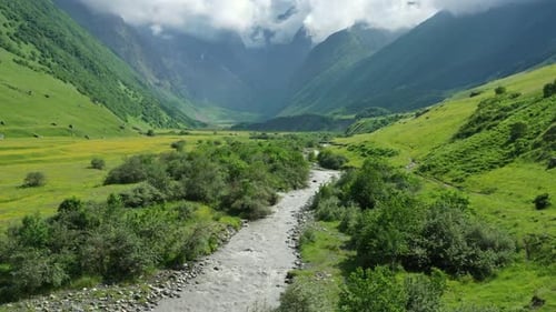 Stream and Valley in Caucasus Mountains