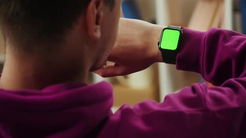 Man Using Smartwatch with Chroma Key Closeup