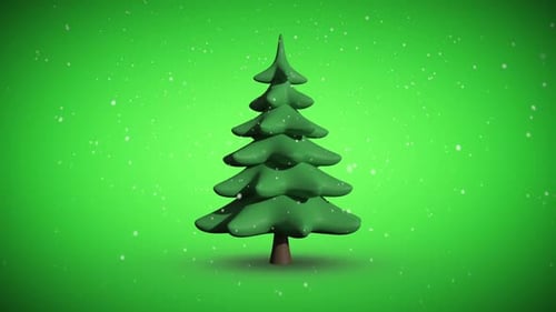 Snow falling on revolving fir tree