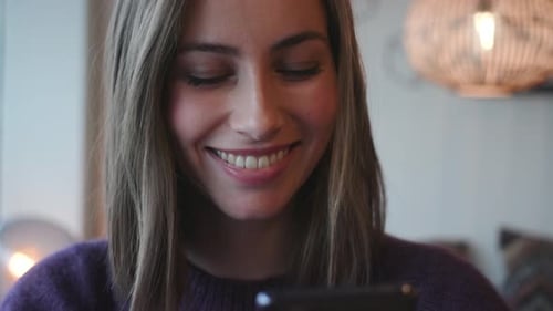 Close Up of Woman Using Her Cellphone