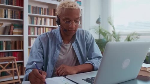 Man Working at Computer in Home Office