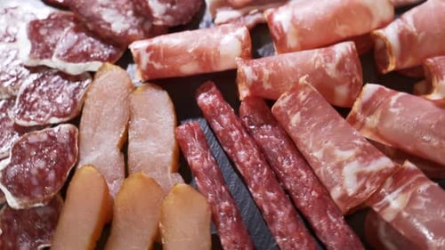 Restaurant Meat Platter (Ham, Salami, Bacon) on the Black Stone Tray