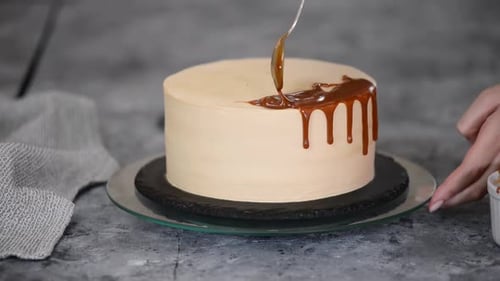 Caramel Drizzle on Delicious Frosted Cake Close Up