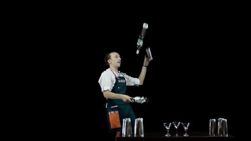 Bartender Performing Flair Juggling with Bottles and Shakers