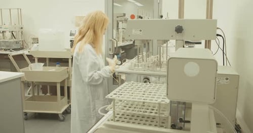 Scientist Working with Scientific Equipment in a Lab