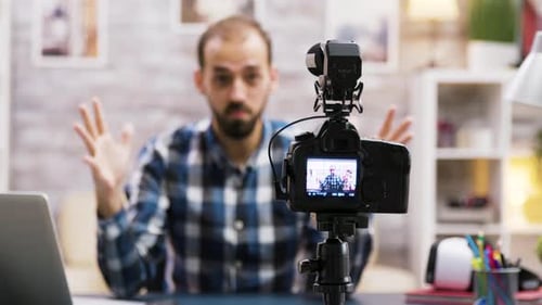Man Records Video in Bright Room