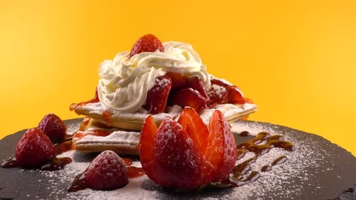 Delicious Waffles with Strawberries and Whipped Cream
