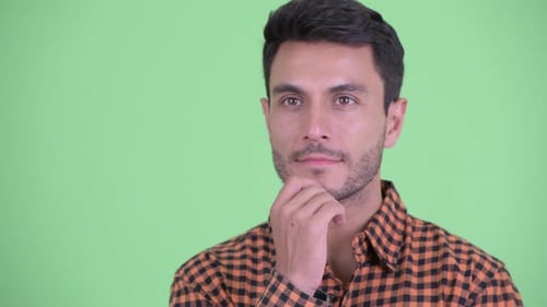 Young Man Thinking and Smiling, Close Up Shot