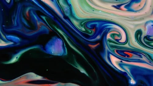 Abstract Liquid Paints Swirl in Colorful Motion