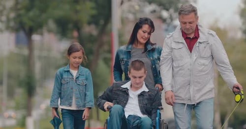 Happy Parents Walk with Children