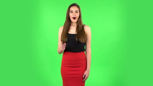 Wow Woman Emotion on a Green Screen in the Studio