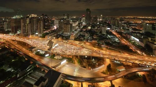 Time lapse of aerial view of busy cars with traffic jam in the rush hour on highway road street
