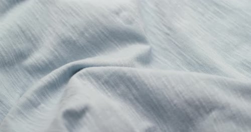 Close Up of Light Blue Textured Fabric