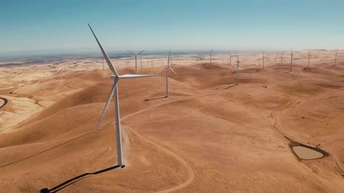 Aerial View of Wind Turbines Energy Production Aerial Shot Over California