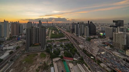 Time lapse of aerial view of busy cars with traffic jam in the rush hour on highway road street