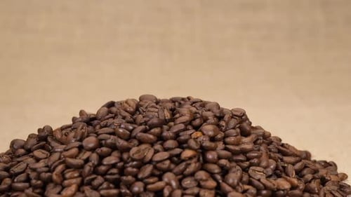 Coffee Beans Pouring into a Large Pile