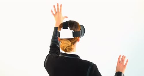 Woman Uses Virtual Reality Headset to Interact