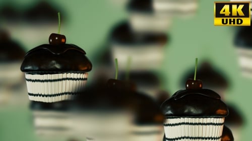 Delicious Chocolate Cherry Cupcakes Floating Background Loop