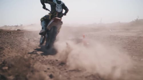 Motorcycle Rider Racing Off Road in the Wilderness
