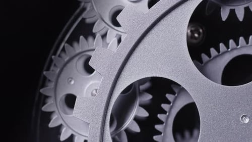 Interlocking Gears Rotating in Smooth Precision