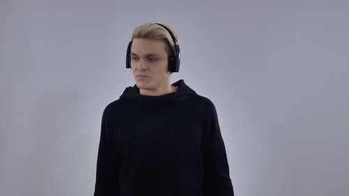 Young Adult Listening to Music with Headphones