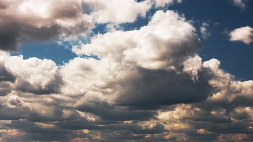 Beautiful Cloudy Dramatic Sky With Fluffy Clouds