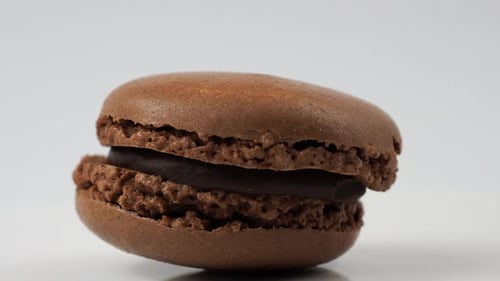 Close Up of a Chocolate Flavored Macaron