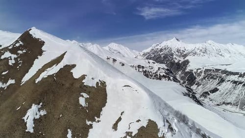 Snowy Mountain Peaks Aerial Winter Landscape