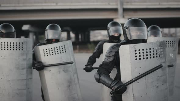 Riot Police Beating Shields with Batons, People Stock Footage ft. riot ...