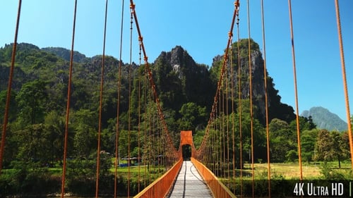4K Empty Wood Suspension Bridge Walkway in the Mountains of Vang Vieng, Laos