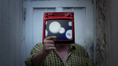 Adult with Red Television Head Displaying Eyeballs