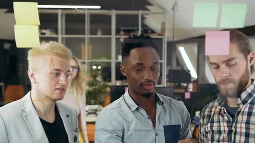 Collaborative Team Brainstorming Ideas in Modern Office