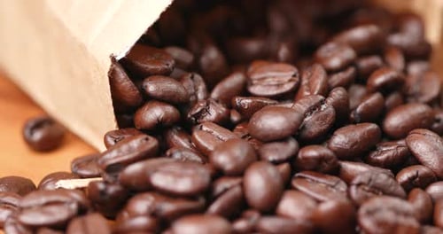 Coffee Beans Spilling from a Paper Bag