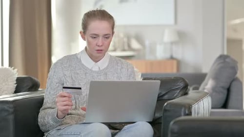Online Payment Failure on Laptop By Young Woman at Home