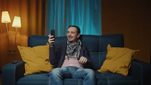 Man Talking on Video Call From Home