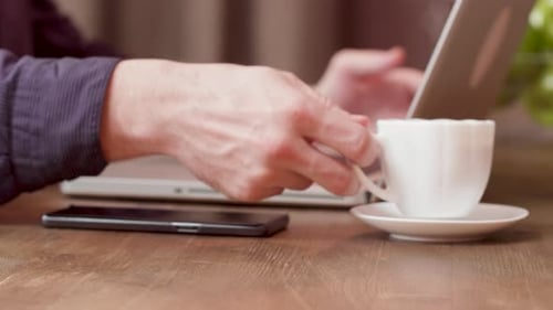 Payment Via Mobile Phone At Office Desk