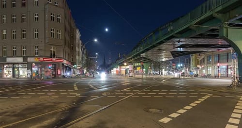 Traffic time lapse of busy street intersection at night