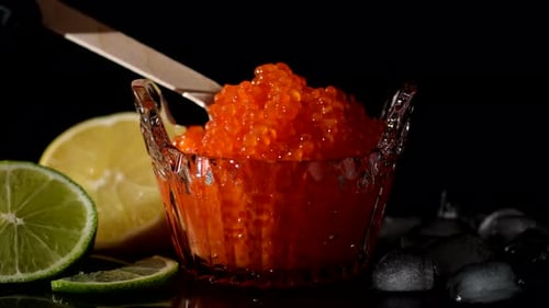 Caviar. Tasting red salmon caviar salted roe