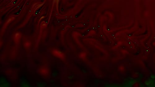 Beautiful Deep Red Liquid in Abstract Liquid Motion From Soap Film Surface