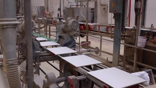 Factory for the production of ceramic tiles on conveyor belt.
