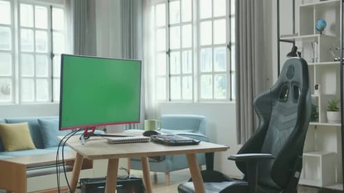 Green Screen Desktop Computer On A Table With A Chair In The Working Room At Home