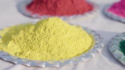 Plates of Colorful Powder for Holi Festival