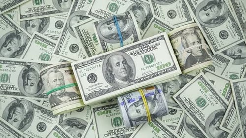 Pile of US Currency with Bundled Dollar Bills