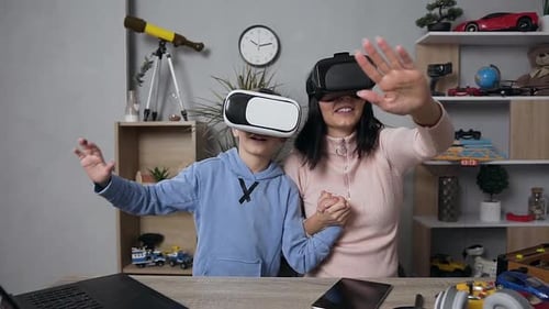 Woman and Child Enjoying Virtual Reality Experience