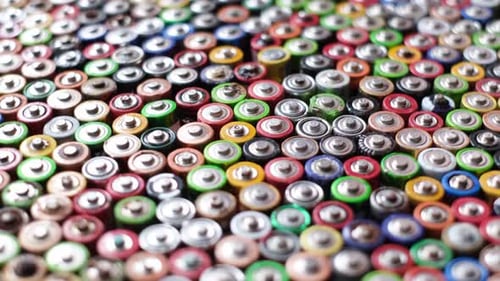 Close-Up of Multicolored Batteries creating an Abstract Pattern