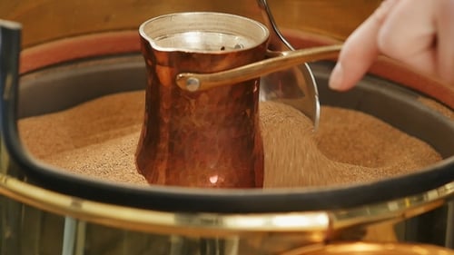 Making coffee on the sand